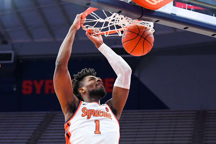 Quincy Guerrier dunks against the Buffalo Bulls on December 19, 2020 at the Carrier Dome in Syracuse, New York.